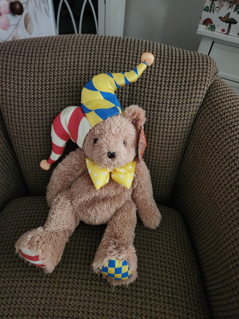 Plush Jester Teddy with Colorful Hat & Bow